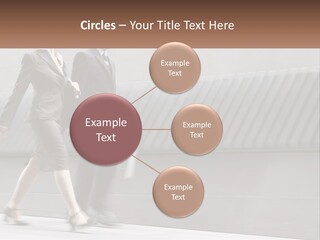 A Business Man And Woman Walking Down A Street PowerPoint Template