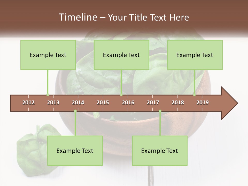 A Wooden Bowl Filled With Green Spinach Leaves PowerPoint Template