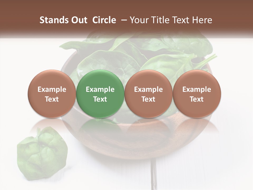 A Wooden Bowl Filled With Green Spinach Leaves PowerPoint Template