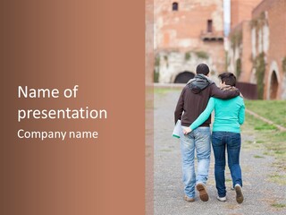 A Man And Woman Walking Down A Road With A Brick Building In The Background PowerPoint Template