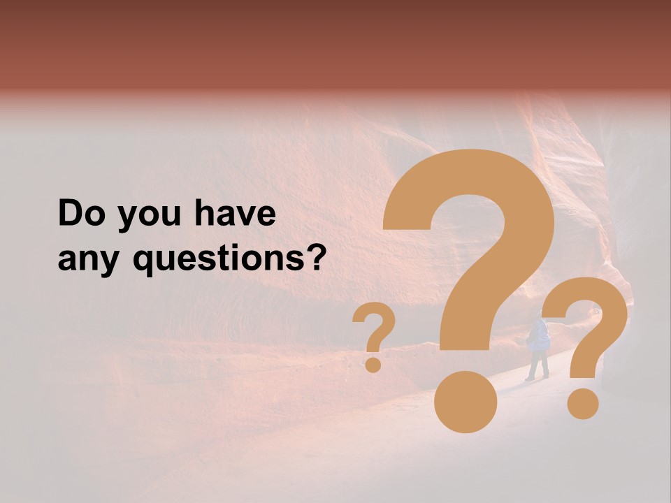 A Person Standing In The Middle Of A Canyon PowerPoint Template