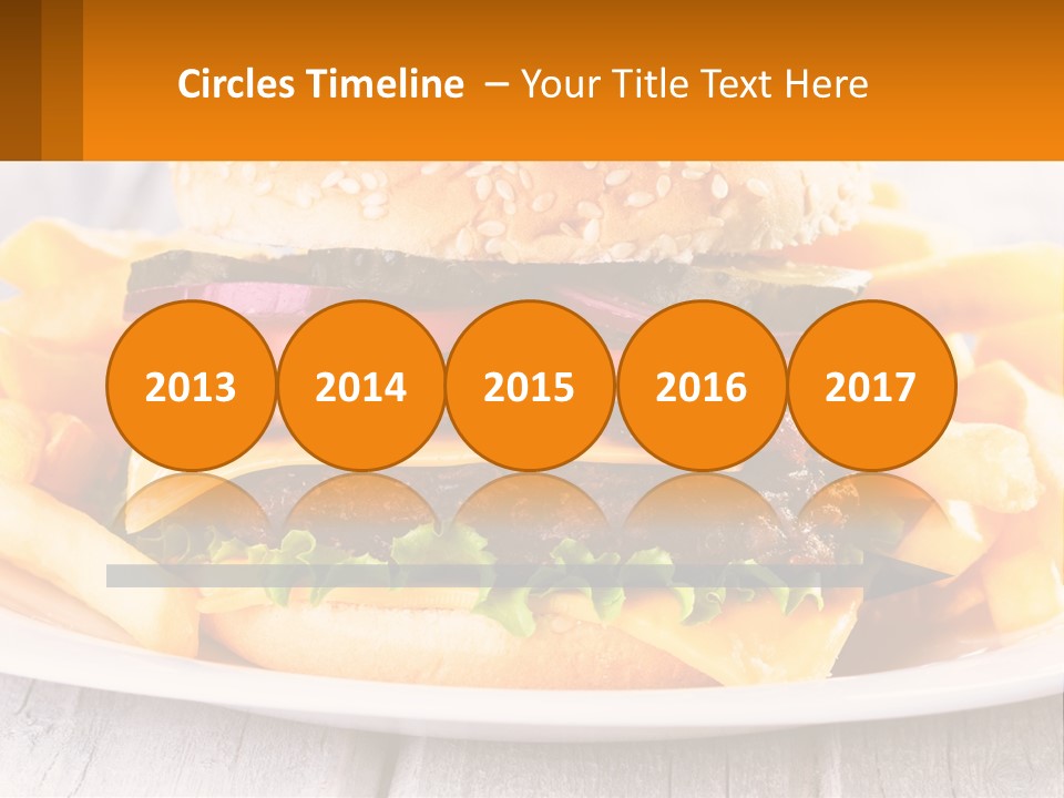 A Hamburger And French Fries On A Plate PowerPoint Template