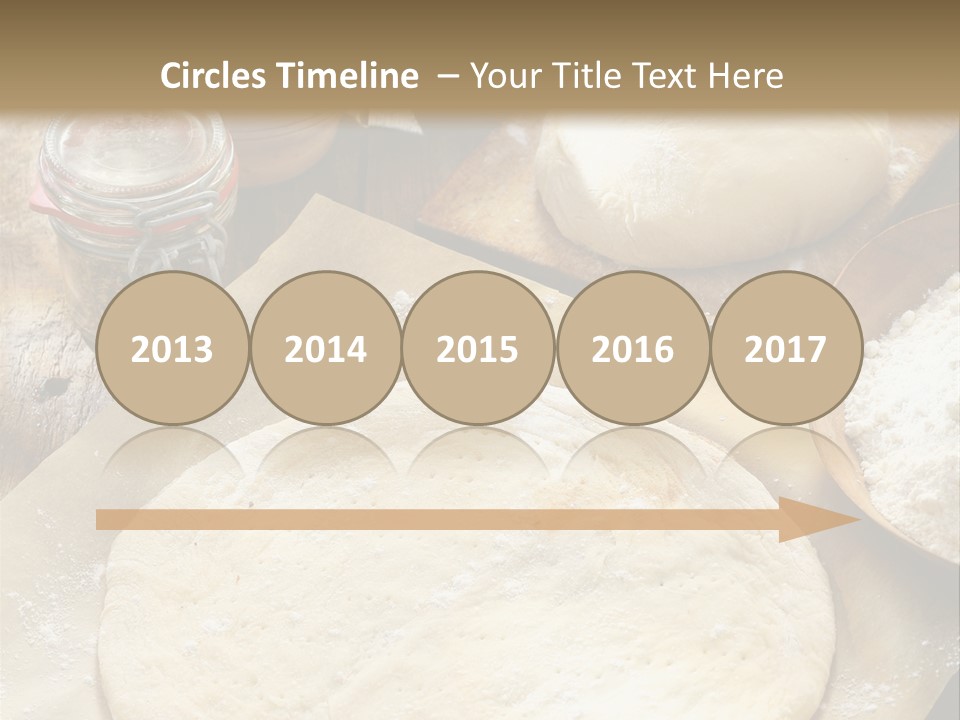 A Table Topped With Lots Of Dough On Top Of A Wooden Table PowerPoint Template