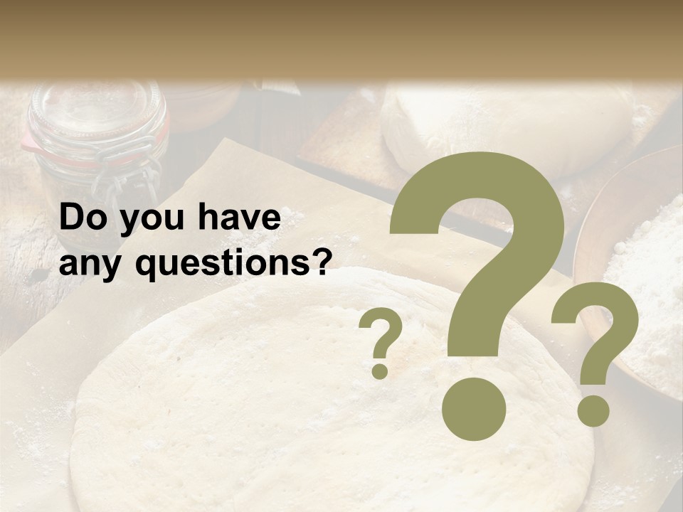 A Table Topped With Lots Of Dough On Top Of A Wooden Table PowerPoint Template