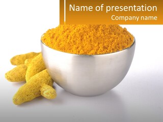 A Metal Bowl Filled With Yellow Powder Next To A Pile Of Yellow Powder PowerPoint Template