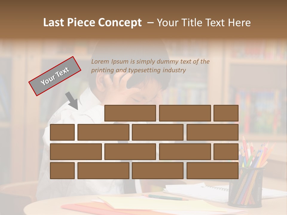 A Young Boy Sitting At A Desk In Front Of A Book Shelf PowerPoint Template