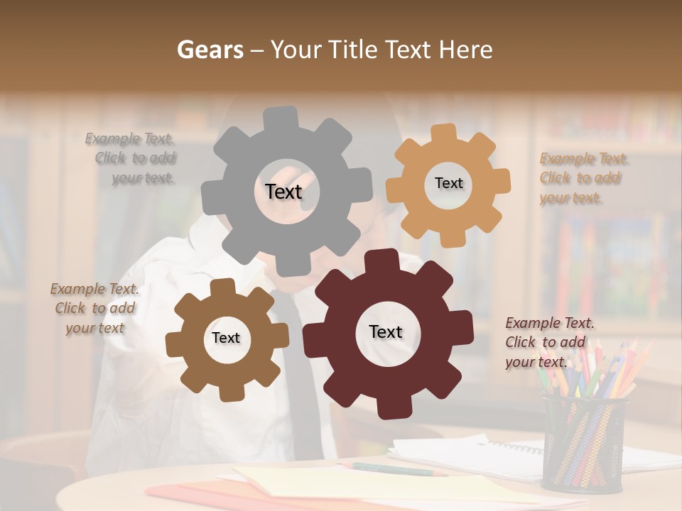 A Young Boy Sitting At A Desk In Front Of A Book Shelf PowerPoint Template