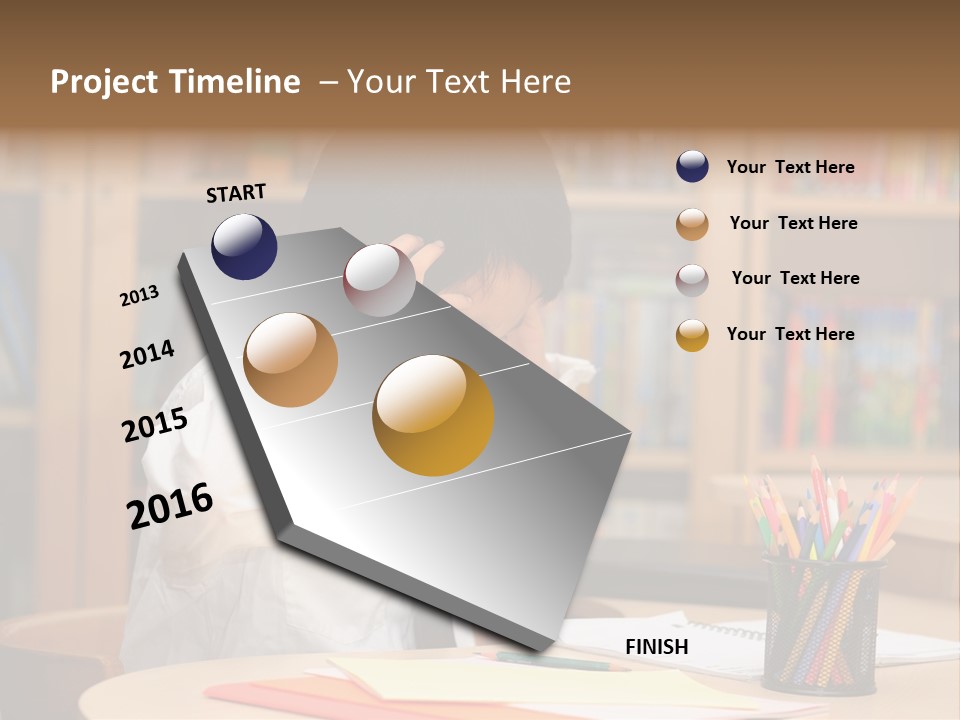 A Young Boy Sitting At A Desk In Front Of A Book Shelf PowerPoint Template