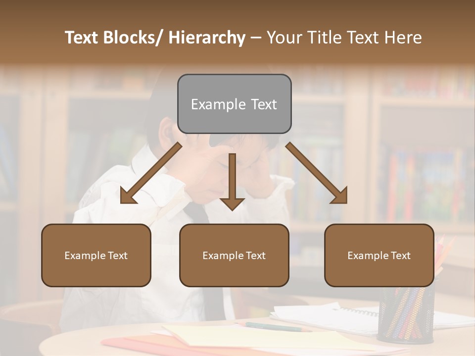 A Young Boy Sitting At A Desk In Front Of A Book Shelf PowerPoint Template