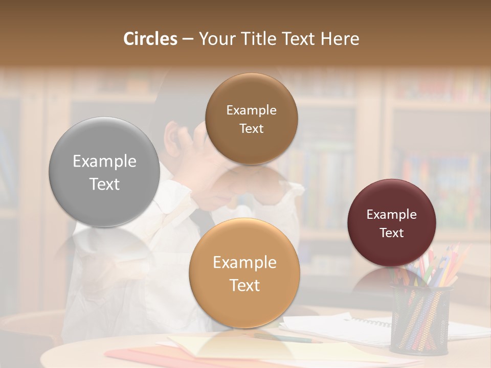 A Young Boy Sitting At A Desk In Front Of A Book Shelf PowerPoint Template