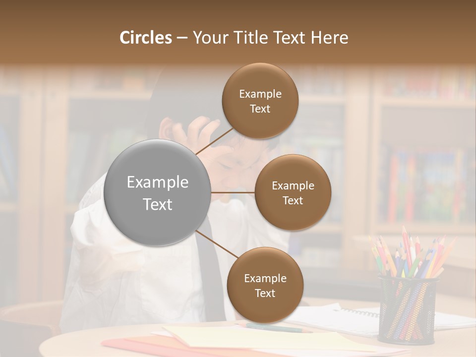 A Young Boy Sitting At A Desk In Front Of A Book Shelf PowerPoint Template