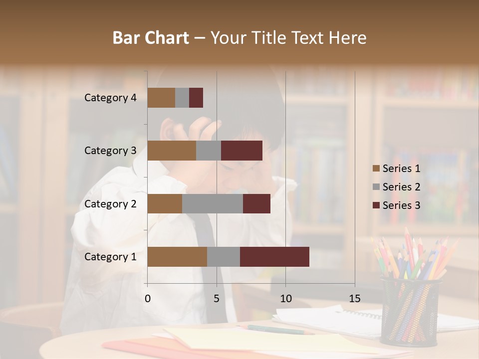A Young Boy Sitting At A Desk In Front Of A Book Shelf PowerPoint Template
