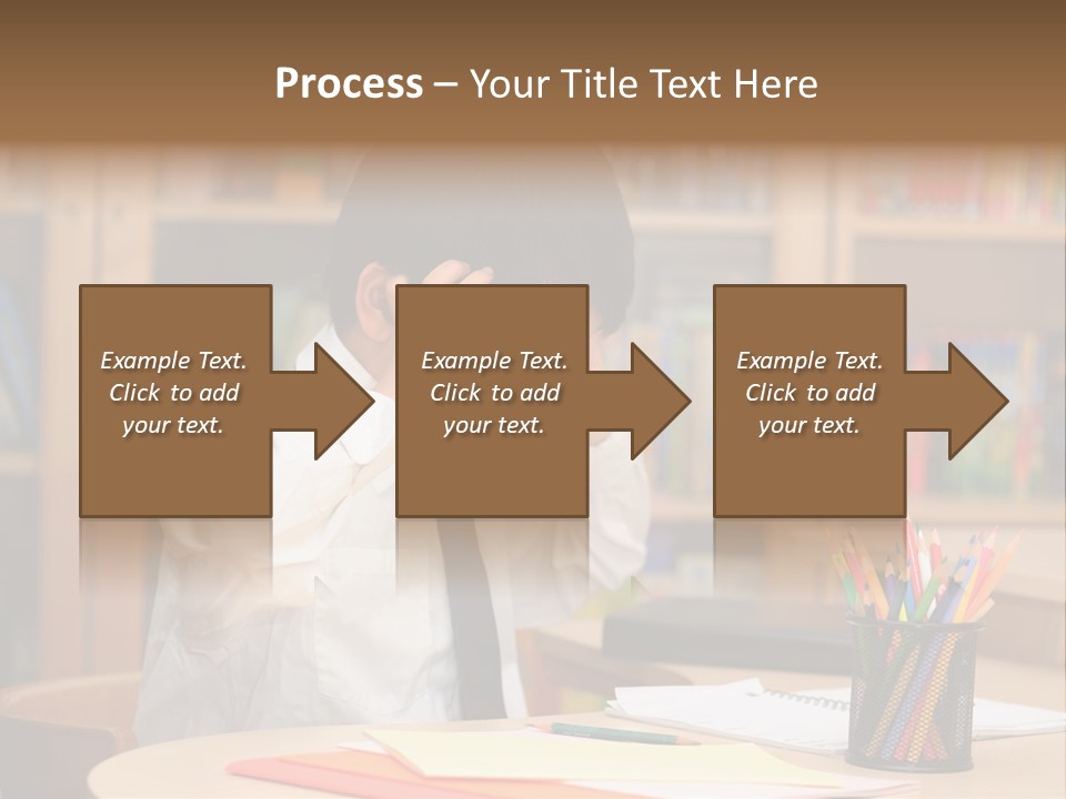 A Young Boy Sitting At A Desk In Front Of A Book Shelf PowerPoint Template