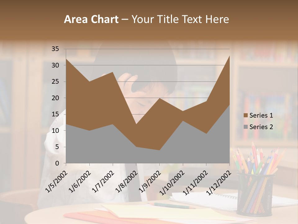 A Young Boy Sitting At A Desk In Front Of A Book Shelf PowerPoint Template