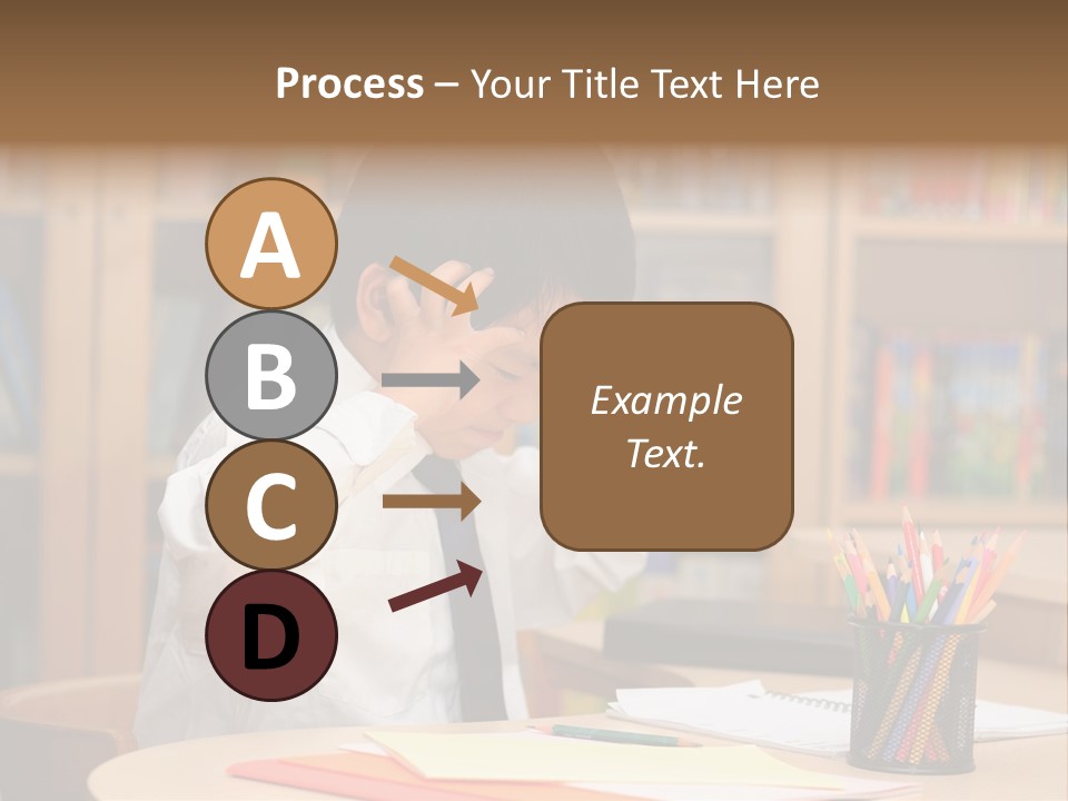 A Young Boy Sitting At A Desk In Front Of A Book Shelf PowerPoint Template