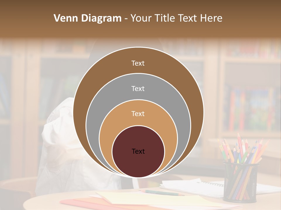 A Young Boy Sitting At A Desk In Front Of A Book Shelf PowerPoint Template