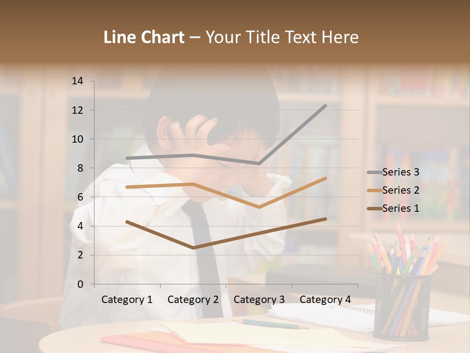 A Young Boy Sitting At A Desk In Front Of A Book Shelf PowerPoint Template