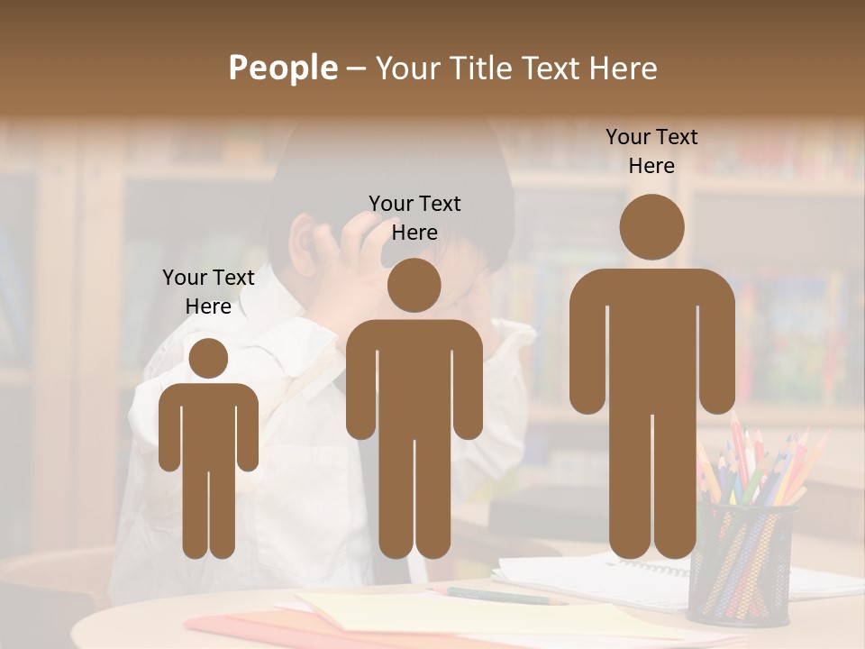 A Young Boy Sitting At A Desk In Front Of A Book Shelf PowerPoint Template