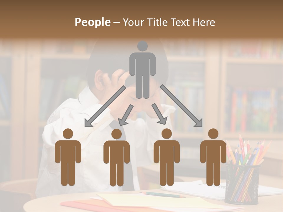 A Young Boy Sitting At A Desk In Front Of A Book Shelf PowerPoint Template