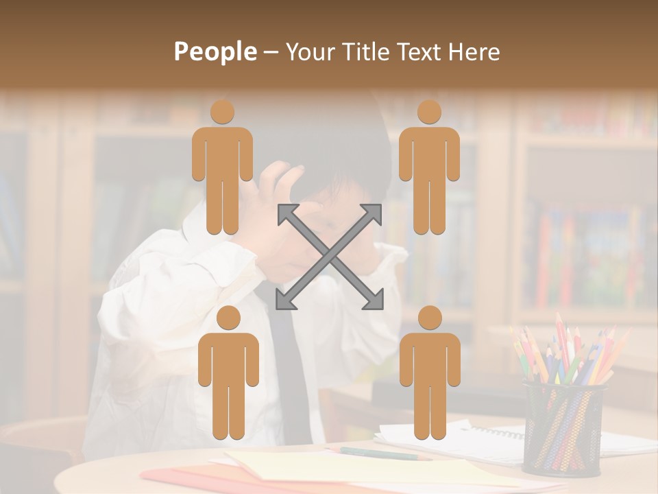 A Young Boy Sitting At A Desk In Front Of A Book Shelf PowerPoint Template