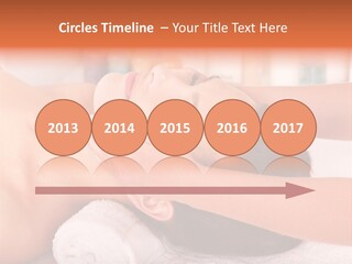 A Woman Getting A Facial Massage In A Spa PowerPoint Template
