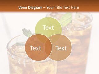 Two Glasses Of Ice Tea With Mint On A Table PowerPoint Template