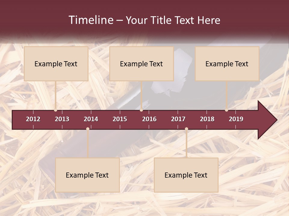 A Bottle Of Wine Sitting On Top Of Straw PowerPoint Template