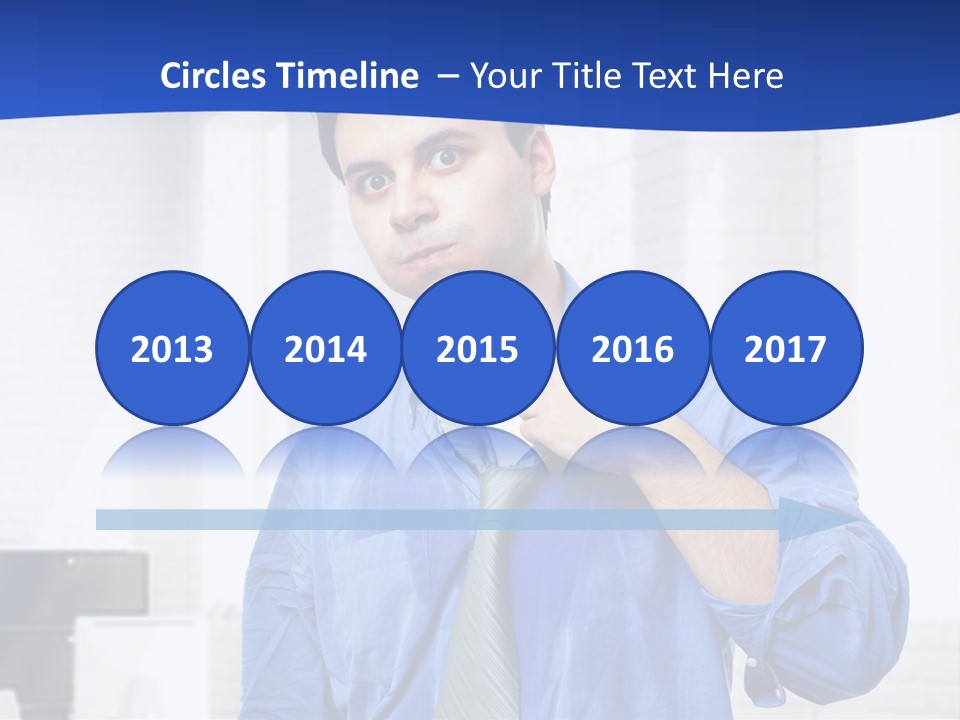 A Man In A Blue Shirt And Tie PowerPoint Template