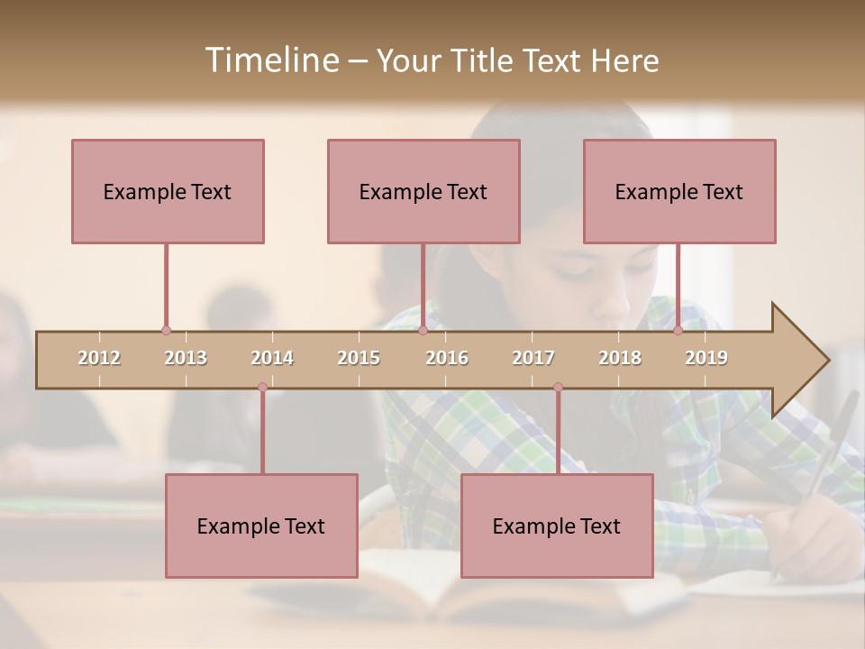 A Young Girl Sitting At A Desk With A Book In Front Of Her PowerPoint Template