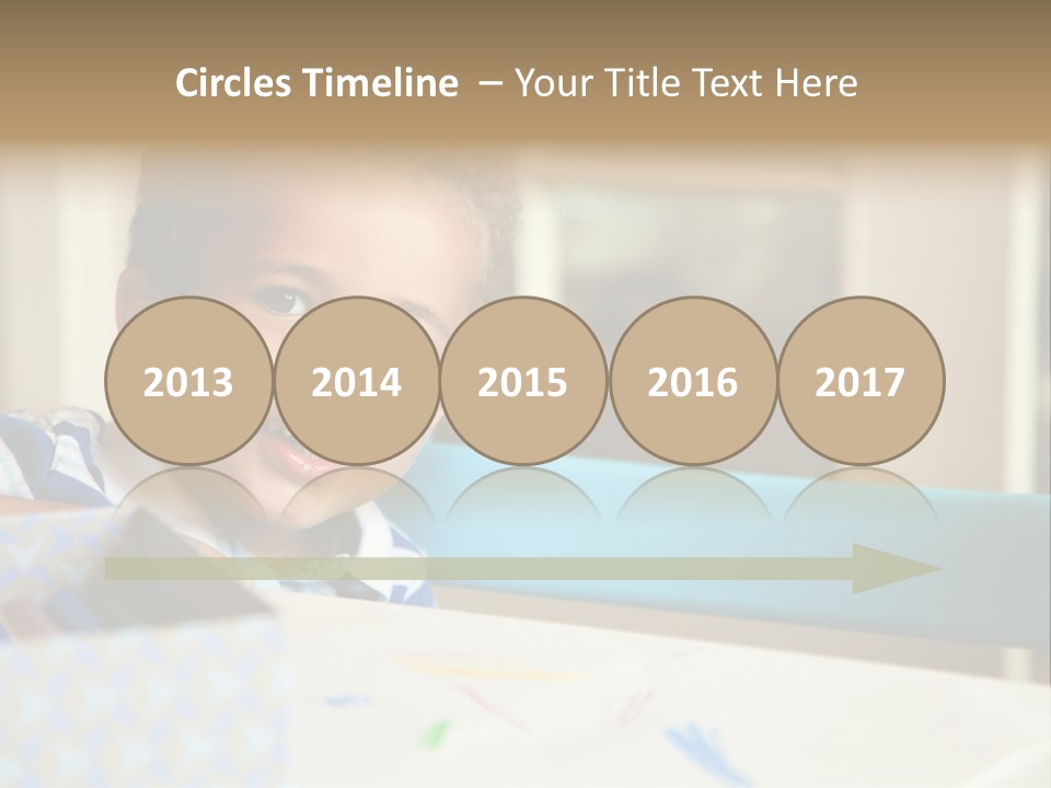 A Young Boy Sitting At A Table With A Blue Chair PowerPoint Template