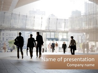 A Group Of People Walking Down A Street PowerPoint Template