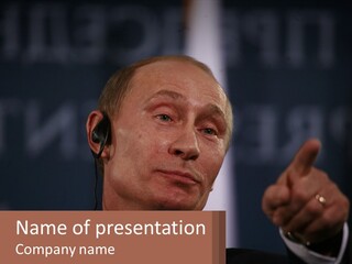 A Man In A Suit Giving A Presentation PowerPoint Template