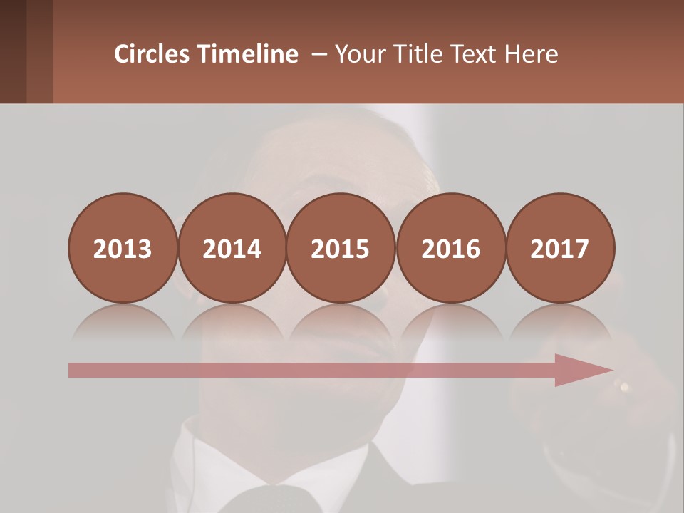 A Man In A Suit Giving A Presentation PowerPoint Template