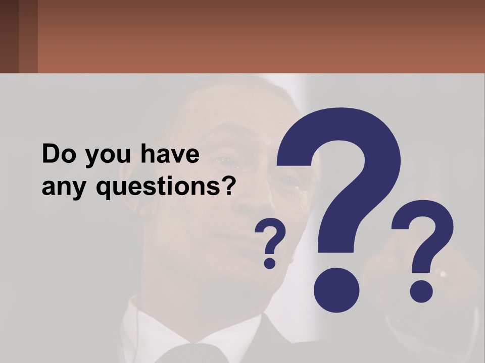 A Man In A Suit Giving A Presentation PowerPoint Template