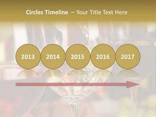 A Group Of Wine Glasses Filled With White And Red Wine PowerPoint Template