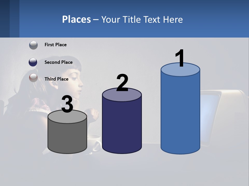 A Little Girl Sitting In Front Of A Computer PowerPoint Template