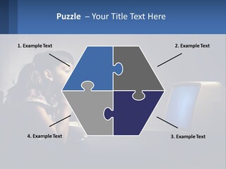 A Little Girl Sitting In Front Of A Computer PowerPoint Template