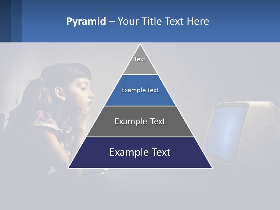 A Little Girl Sitting In Front Of A Computer PowerPoint Template