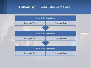 A Little Girl Sitting In Front Of A Computer PowerPoint Template