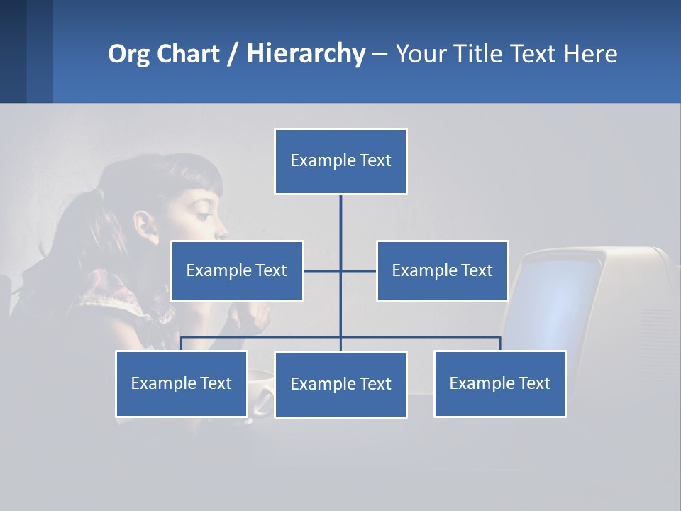 A Little Girl Sitting In Front Of A Computer PowerPoint Template