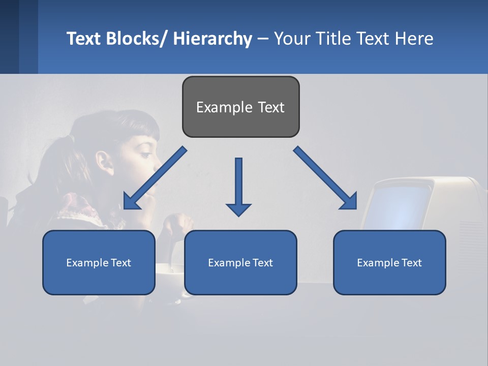 A Little Girl Sitting In Front Of A Computer PowerPoint Template
