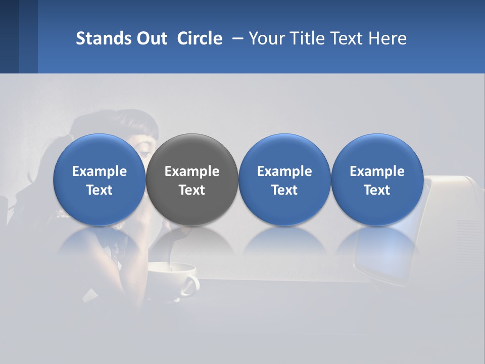 A Little Girl Sitting In Front Of A Computer PowerPoint Template