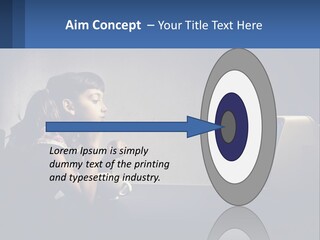 A Little Girl Sitting In Front Of A Computer PowerPoint Template