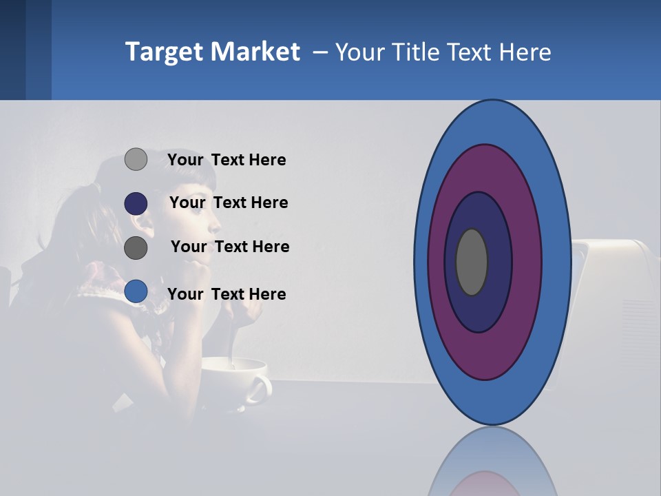 A Little Girl Sitting In Front Of A Computer PowerPoint Template