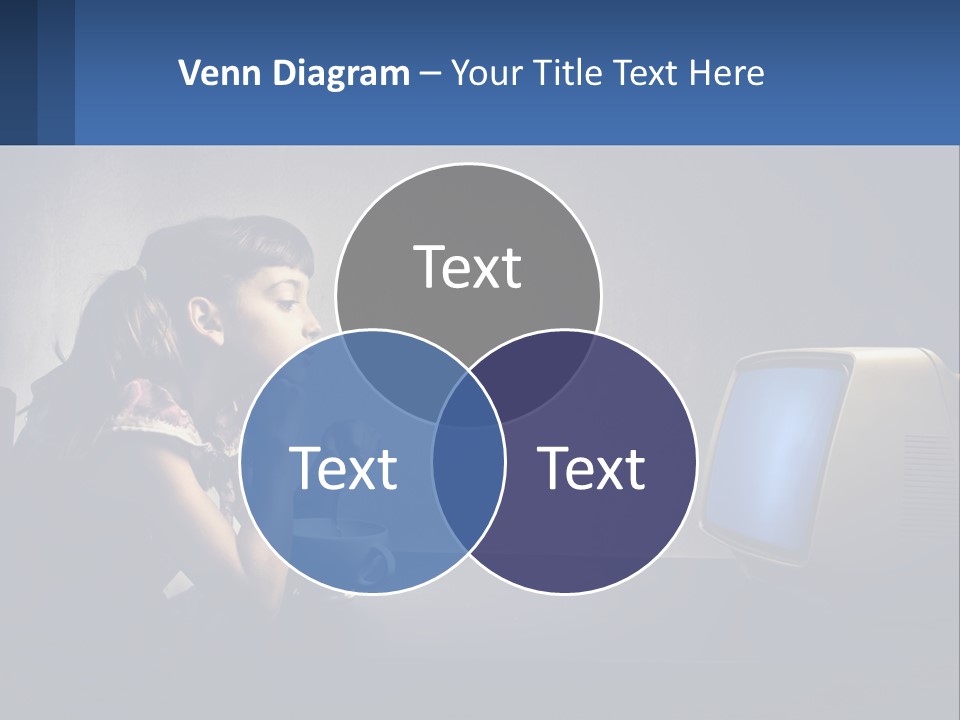 A Little Girl Sitting In Front Of A Computer PowerPoint Template