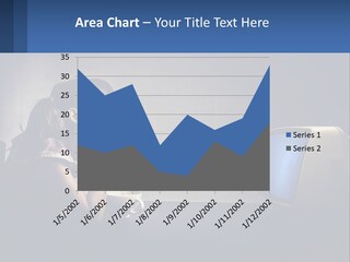 A Little Girl Sitting In Front Of A Computer PowerPoint Template