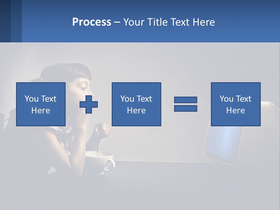 A Little Girl Sitting In Front Of A Computer PowerPoint Template