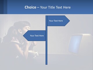 A Little Girl Sitting In Front Of A Computer PowerPoint Template