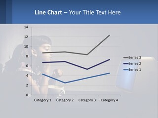 A Little Girl Sitting In Front Of A Computer PowerPoint Template