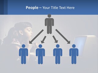 A Little Girl Sitting In Front Of A Computer PowerPoint Template